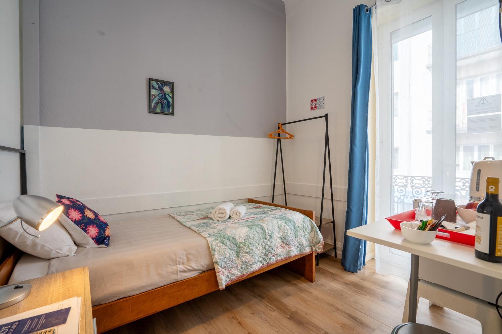 Quarto Individual com Varanda
