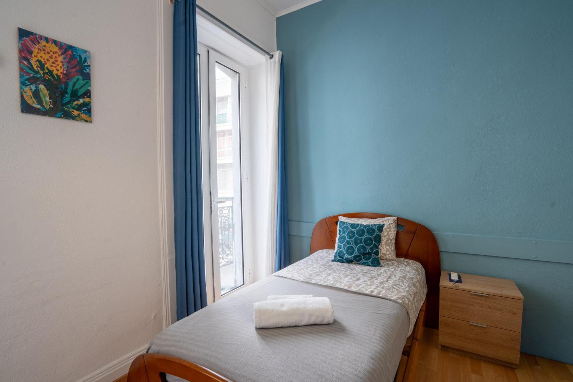 Quarto Individual com Varanda